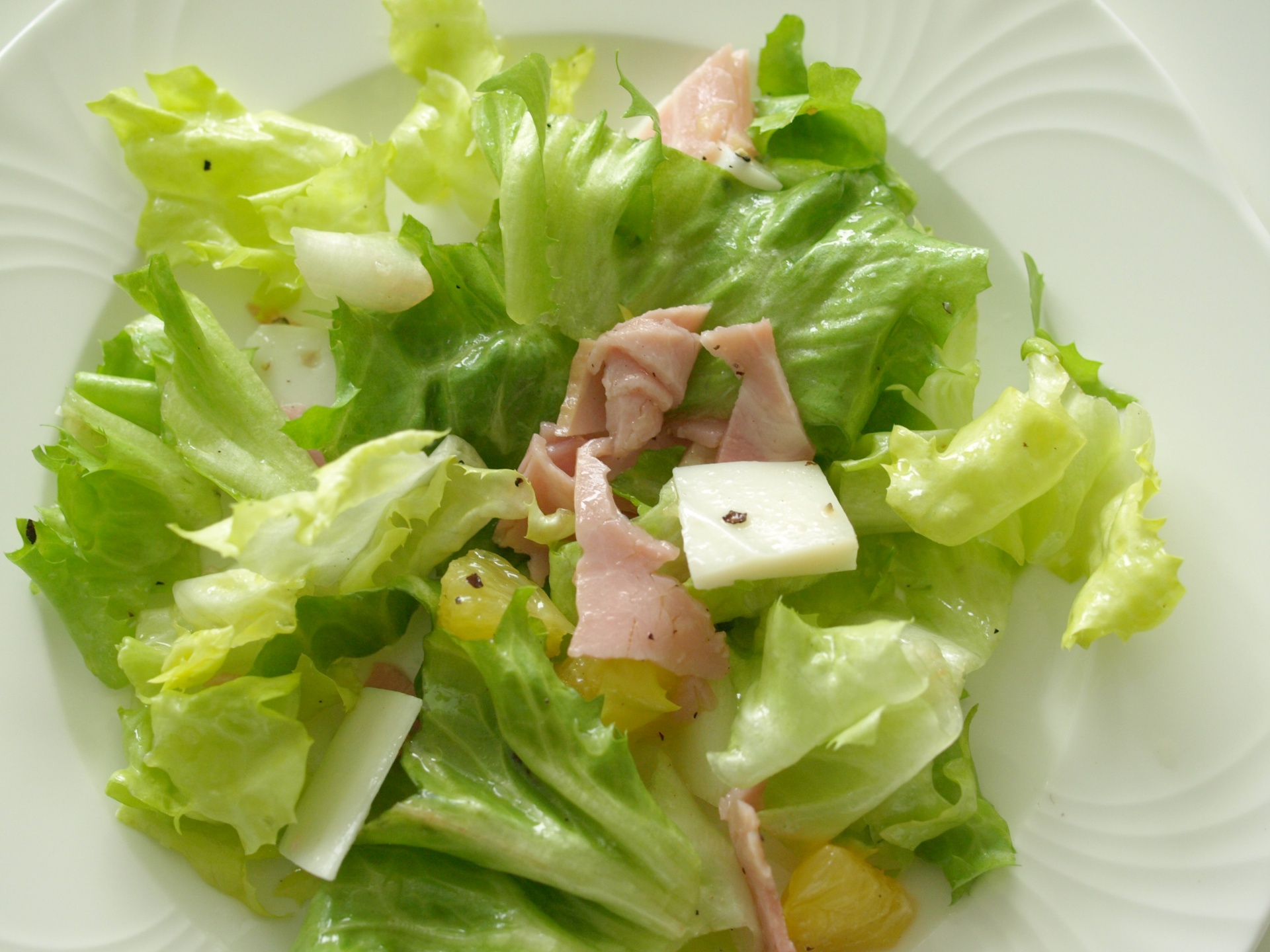 Endiviensalat mit Orangenfilets, Schinken und
              Ziegenkse