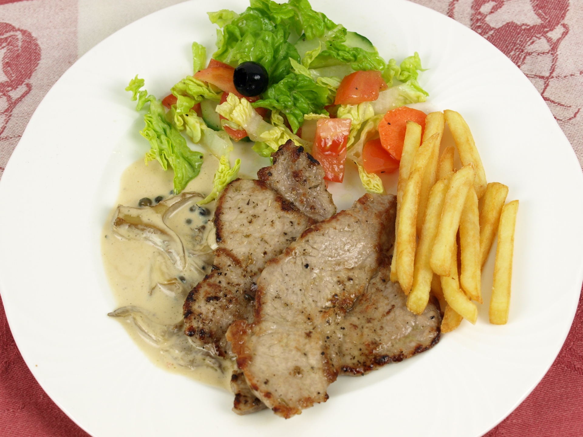 Kalbsschnitzel mit Austernpilzen in
              Mascarponecreme
