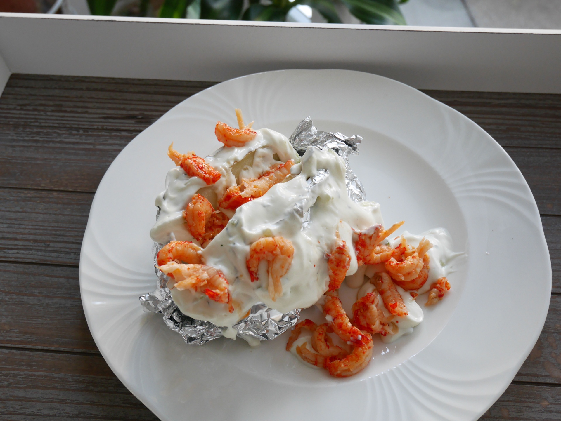 Ofenkartoffeln mit weier Sauce und
              Flusskrebsen